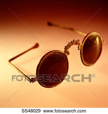 Stock Photograph - rusty and bent 
sunglasses. fotosearch 
- search stock 
photos, pictures, 
images, and photo 
clipart