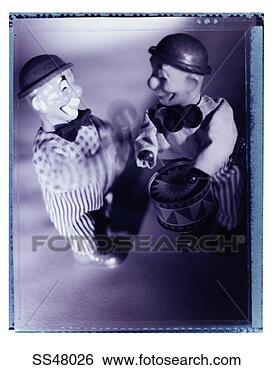 Stock Photo - two clown dolls. 
fotosearch - search 
stock photos, 
pictures, images, 
and photo clipart
