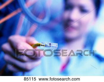 Stock Image - close-up of a 
modem cable. fotosearch 
- search stock 
photos, pictures, 
images, and photo 
clipart
