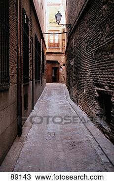 Stock Photo - alley in toledo, 
spain. fotosearch 
- search stock 
photos, pictures, 
images, and photo 
clipart