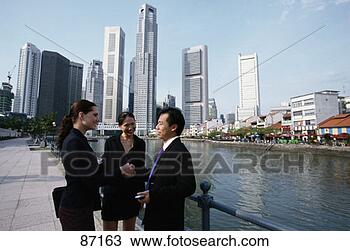 Drawing - businesspeople 
stand near river, 
singapore. fotosearch 
- search clipart, 
illustration, 
drawings and vector 
eps graphics images