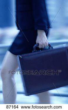 Stock Illustration - low section of 
businesswoman 
with briefcase. 
fotosearch - search 
clipart, illustration, 
drawings and vector 
eps graphics images