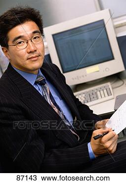 Drawing - portrait of an 
asian businessman 
near computer. 
fotosearch - search 
clipart, illustration, 
drawings and vector 
eps graphics images