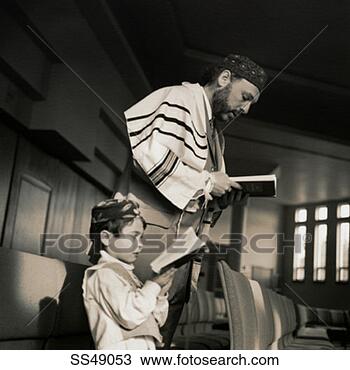 Stock Photo - jewish father 
and son praying 
at synagogue. 
fotosearch - search 
stock photos, 
pictures, images, 
and photo clipart
