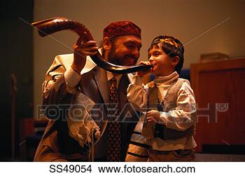 Stock Photo - jewish father 
and son with a 
shofar. fotosearch 
- search stock 
photos, pictures, 
images, and photo 
clipart