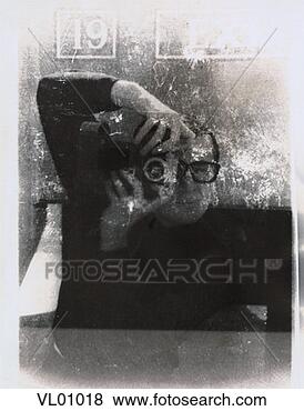 Stock Illustration - man taking a photograph. 
fotosearch - search 
clipart, illustration, 
drawings and vector 
eps graphics images