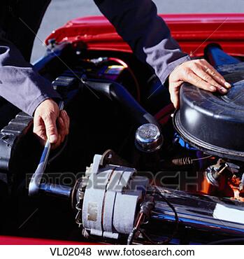 Stock Photo - machanic working 
on a car engine. 
fotosearch - search 
stock photos, 
pictures, images, 
and photo clipart
