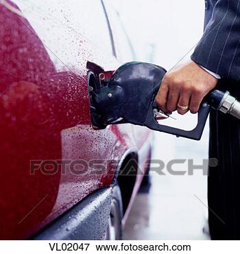Picture - man pumping gas. 
fotosearch - search 
stock photos, 
pictures, images, 
and photo clipart