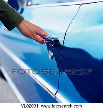 Stock Photography - woman opening 
car door. fotosearch 
- search stock 
photos, pictures, 
images, and photo 
clipart