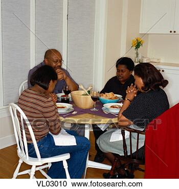 Stock Photography - family praying 
before meal. fotosearch 
- search stock 
photos, pictures, 
images, and photo 
clipart