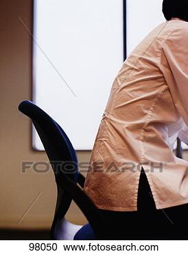 Stock Photography - woman sitting 
in a chair. fotosearch 
- search stock 
photos, pictures, 
images, and photo 
clipart