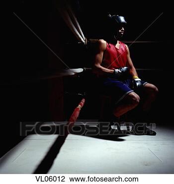 Stock Photo - boxer, sitting 
in boxing ring. 
fotosearch - search 
stock photos, 
pictures, images, 
and photo clipart