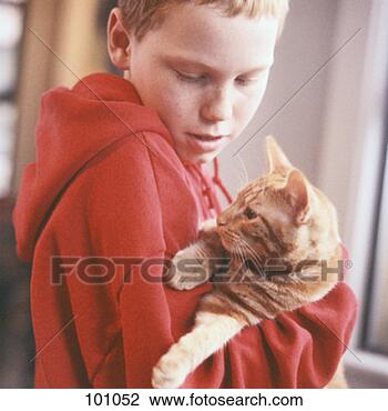 Stock Photo - boy holding his 
pet cat. fotosearch 
- search stock 
photos, pictures, 
images, and photo 
clipart