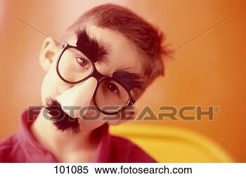 Stock Image - boy wearing groucho 
marx disguise. 
fotosearch - search 
stock photos, 
pictures, images, 
and photo clipart