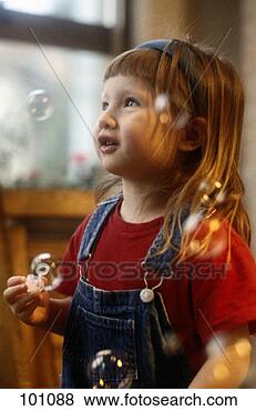 Stock Photo - girl blowing bubbles. 
fotosearch - search 
stock photos, 
pictures, images, 
and photo clipart