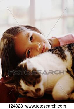 Stock Photo - young girl cuddling 
with house cat. 
fotosearch - search 
stock photos, 
pictures, images, 
and photo clipart