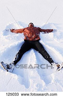 Stock Photo - man making snow 
angels. fotosearch 
- search stock 
photos, pictures, 
images, and photo 
clipart