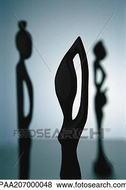 Stock Photo - statuette, woman, 
african, africa, 
art, feminine, 
femininity. fotosearch 
- search stock 
photos, pictures, 
images, and photo 
clipart