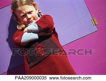 Stock Image - little girl frowning 
and crossing arms. 
fotosearch - search 
stock photos, 
pictures, images, 
and photo clipart