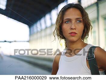 Stock Photograph - woman, head and 
shoulders, looking 
away, in train 
station. fotosearch 
- search stock 
photos, pictures, 
images, and photo 
clipart