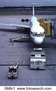Stock Photography - plane at gate 
in moscow airport 
russia. fotosearch 
- search stock 
photos, pictures, 
images, and photo 
clipart