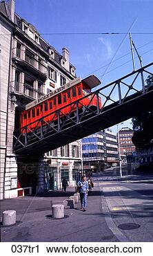 Stock Photography - polybahn emerging 
from side of building 
switzerland. fotosearch 
- search stock 
photos, pictures, 
images, and photo 
clipart