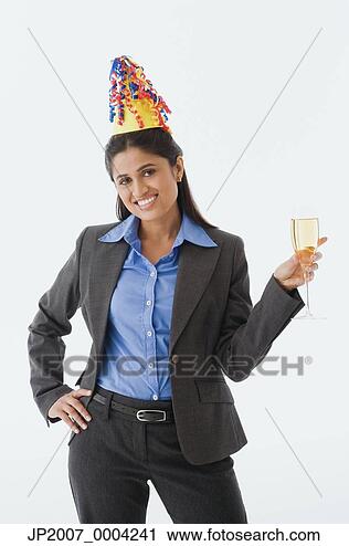 Stock Photography - indian businesswoman 
wearing party 
hat. fotosearch 
- search stock 
photos, pictures, 
wall murals, images, 
and photo clipart