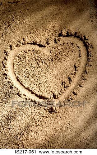 Stock Photography - heart shape on 
sand. fotosearch 
- search stock 
photos, pictures, 
wall murals, images, 
and photo clipart