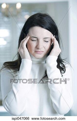 Stock Photo - a woman having 
headache. fotosearch 
- search stock 
photos, pictures, 
wall murals, images, 
and photo clipart