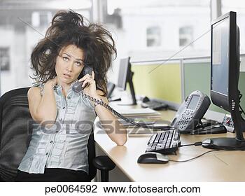 Stock Photo - frazzled businesswoman 
talking on telephone. 
fotosearch - search 
stock photos, 
pictures, wall 
murals, images, 
and photo clipart