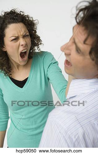 Stock Photography - woman yelling  at boyfriend.  fotosearch - search  stock photos,  pictures, wall  murals, images,  and photo clipart