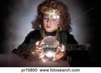Stock Photography - psychic looking in crystal ball. fotosearch - search stock photos, pictures, images, and photo clipart