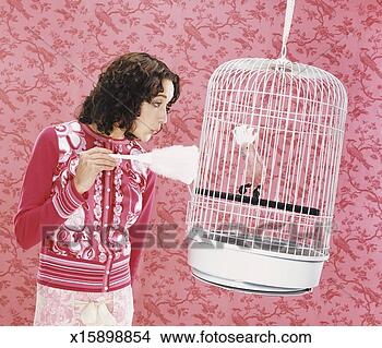 woman-cleaning-bird_%7Ex15898854.jpg
